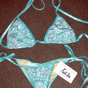 Brand new competition suit Sz small 
Gorgeous